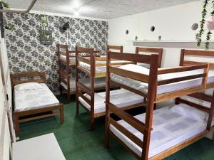 a group of bunk beds in a room at Quartos compartilhados COP30 - BRL in Belém