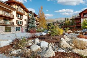 a rock garden in front of a building at Eagle Springs East 206: White Fir Suite in Solitude