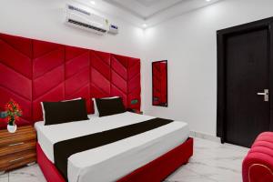 Postel nebo postele na pokoji v ubytování Hotel O G+ + 22 fotografií