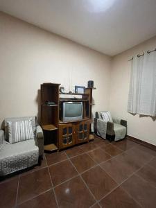 TV a/nebo společenská místnost v ubytování Rustic residence