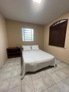 Postel nebo postele na pokoji v ubytování Rustic residence