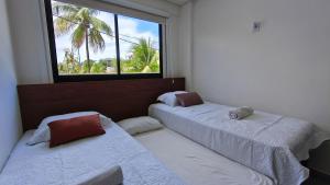 Voodi või voodid majutusasutuse Tours Du Porto by CTA - Centro Porto de Galinhas toas +36 fotot