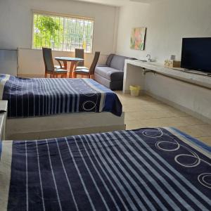 A bed or beds in a room at Luna Azul