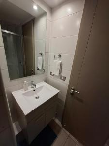 Vannituba majutusasutuses Depto cálido con estilo y excelente ubicación