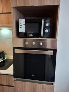 Köök või kööginurk majutusasutuses Depto cálido con estilo y excelente ubicación