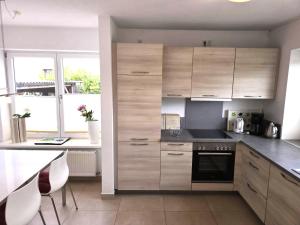 Kuchyň nebo kuchyňský kout v ubytování Mathilde 1 + 13 fotografií