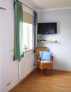 Et tv og/eller underholdning på Ferienhaus Koss 2 + 4 billeder