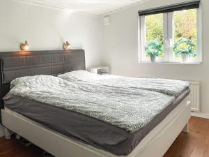 Ένα ή περισσότερα κρεβάτια σε δωμάτιο στο Archipelago Villa with Pool & Patio +24 φωτογραφίες