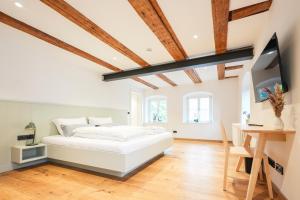 Postel nebo postele na pokoji v ubytování Gasthof am Schloss + 21 fotografií