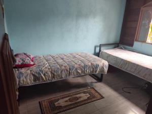 Ένα ή περισσότερα κρεβάτια σε δωμάτιο στο Rancho do tucano