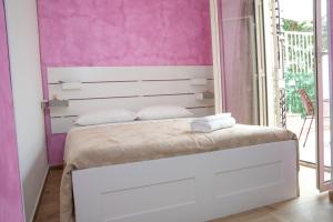 Postel nebo postele na pokoji v ubytování B&B fly