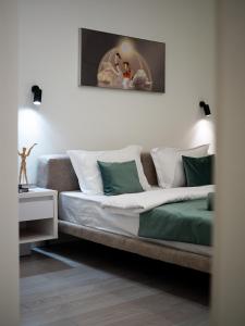 a couch in a living room with at Seven Premium Apartments by Mega Mall in Almaty