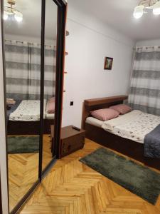 Postel nebo postele na pokoji v ubytování 3- х комнатная квартира в центре