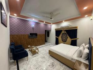 Μια τηλεόραση ή/και κέντρο ψυχαγωγίας στο The Capital Villa +18 φωτογραφίες