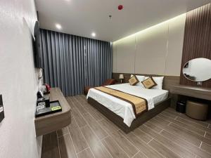 Ένα ή περισσότερα κρεβάτια σε δωμάτιο στο Bảo Ngọc Hotel 2 +18 φωτογραφίες