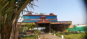 a building with a sign on the front of it at hotel pushkar mountain valley in Pushkar +11 photos