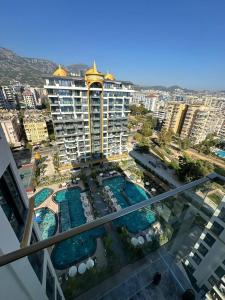 an aerial view of a hotel with pools and buildings at Cebeci tower in Mahmutlar