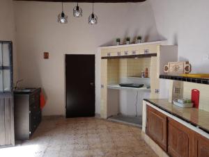 Kuchyň nebo kuchyňský kout v ubytování Casa Serenata Parras