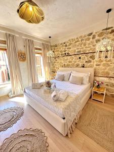 Ένα ή περισσότερα κρεβάτια σε δωμάτιο στο Casa Palma Boutique Hotel +67 φωτογραφίες
