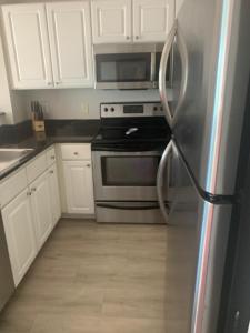 Kuchyň nebo kuchyňský kout v ubytování Madeira Bay Resort