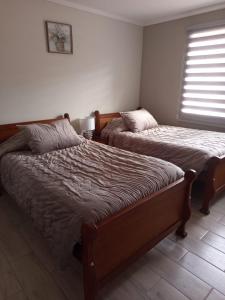 Ένα ή περισσότερα κρεβάτια σε δωμάτιο στο Hostal Terraza Traslaviña