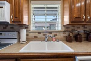 Kuchyň nebo kuchyňský kout v ubytování The Hogue Penthouse - Unwind and Relax + 12 fotografií