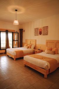 Katil atau katil-katil dalam bilik di Hotel Pedregal +16 gambar