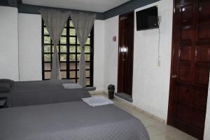 Μια τηλεόραση ή/και κέντρο ψυχαγωγίας στο Hotel Boutique Camino Viejo