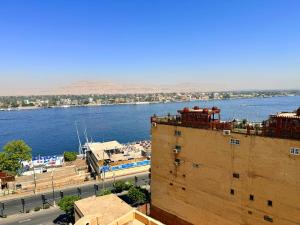 a view of a large body of water from a building at Al Fayrouz Palace Apartments in Luxor