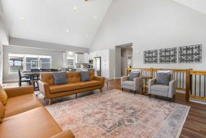 a living room with couches and a dining room at Ingallview at Branson Cove Indoor Pool in Hollister