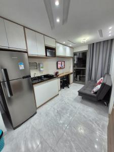 Kuchyň nebo kuchyňský kout v ubytování Apto ao lado do metrô de SP