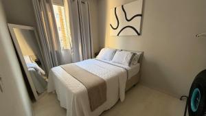Postel nebo postele na pokoji v ubytování Seu lar perfeito fora de casa Prox ao Shopping Iguatemi
