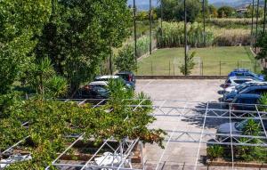 an overhead view of a parking lot with cars parked at 2 Bedroom Amazing Apartment In Casal Velino in Castellammare di Velia +12 photos