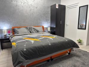 Ένα ή περισσότερα κρεβάτια σε δωμάτιο στο Mitić Apartmani 1 +79 φωτογραφίες