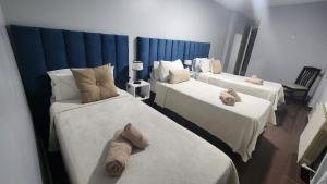 Postel nebo postele na pokoji v ubytování Essencial Hotel Spa