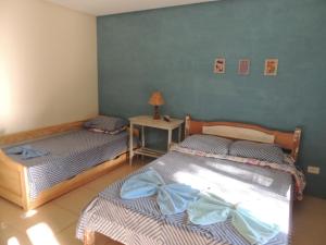 Postel nebo postele na pokoji v ubytování Canto Verde Pousada
