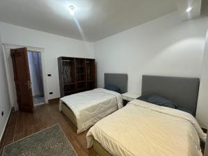 Ένα ή περισσότερα κρεβάτια σε δωμάτιο στο White Greece villa +2 φωτογραφίες