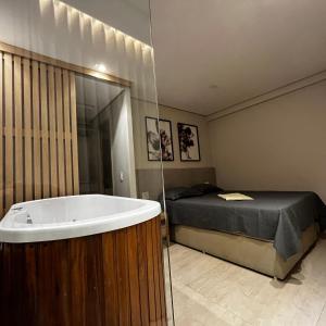 Χώρος καθιστικού στο Refúgio Executivo Exclusivo Duplex com Ofurô +25 φωτογραφίες