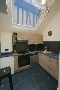 Køkken eller tekøkken på charmant appartement 4 pers hyper centre, au calme