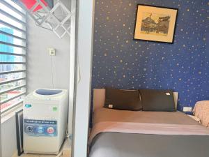 Postel nebo postele na pokoji v ubytování Citizen apartment - rivergate