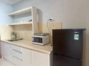 Kuchyň nebo kuchyňský kout v ubytování Citizen apartment - rivergate