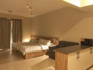 Postel nebo postele na pokoji v ubytování Nubia El Karma Beach Resort & Aqua Park + 113 fotografií