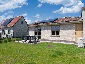 a house with solar panels on the roof at Westhinder I H21 in Koksijde