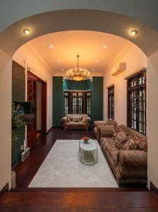 Et opholdsområde på Villa Paradise 6 Bedrooms