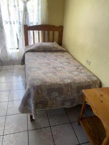 Una cama o camas en una habitación de Casa Elia