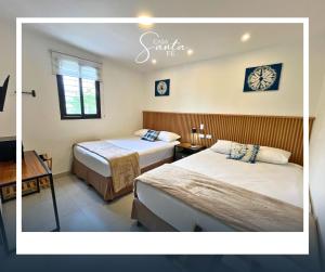 Postel nebo postele na pokoji v ubytování Casa Santa Fe