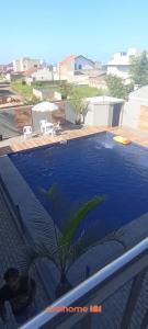 Bazén v ubytování Casa em Pontal do Parana a 300m do Mar nebo v jeho okolí