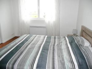 Ένα ή περισσότερα κρεβάτια σε δωμάτιο στο Apartment in Lilia near Kastell Ac"h Strand