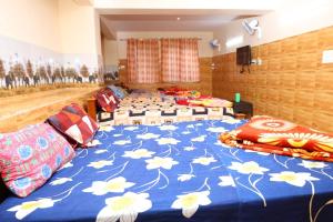 Ένα ή περισσότερα κρεβάτια σε δωμάτιο στο valparai villas