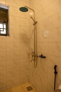 Koupelna v ubytování JH Luxury Suites + 25 fotografií